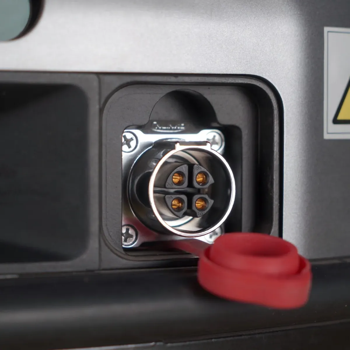 AMR charging connector with protective cap
